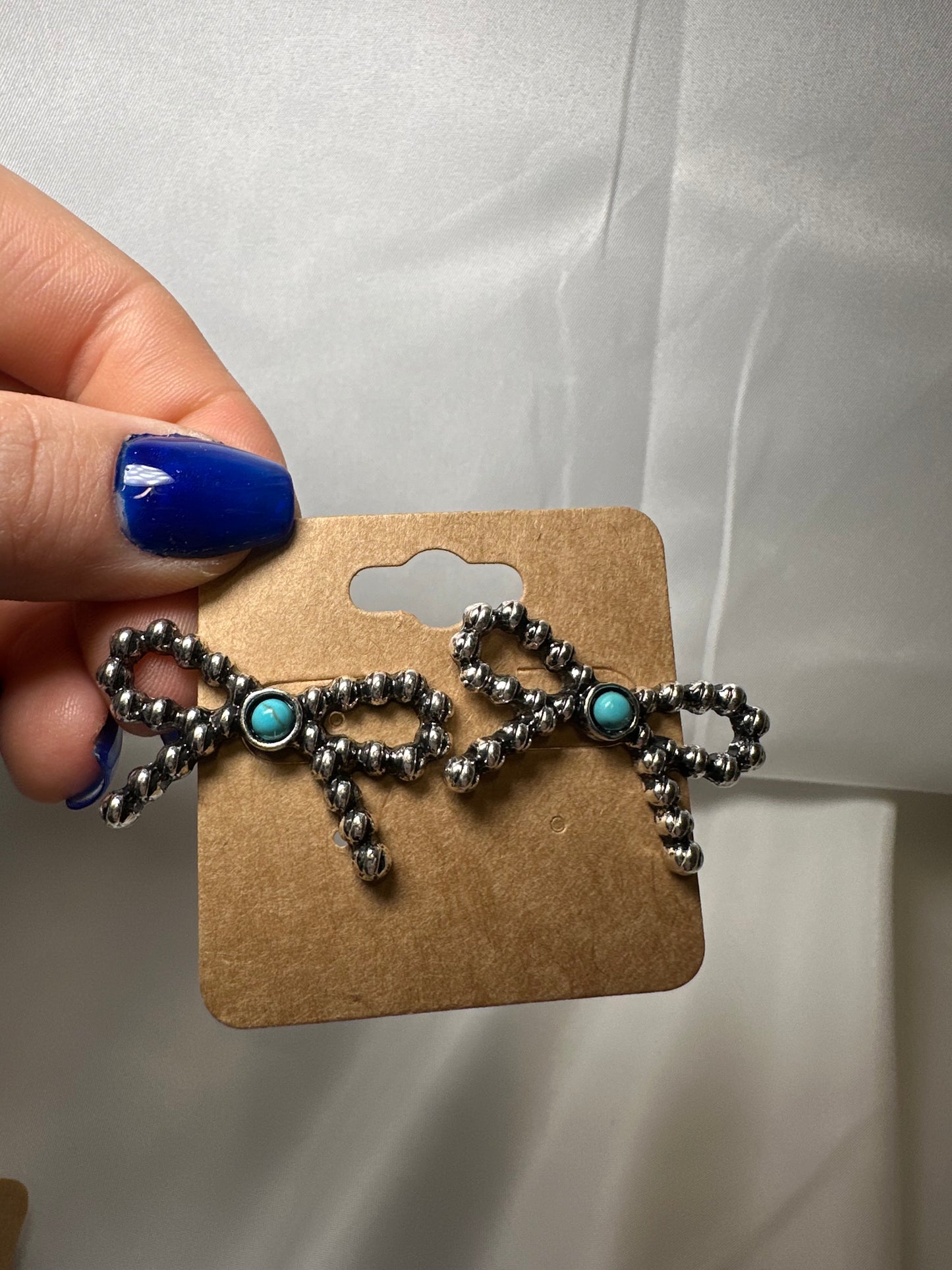 3D Ball TXR Bow Stud Earrings