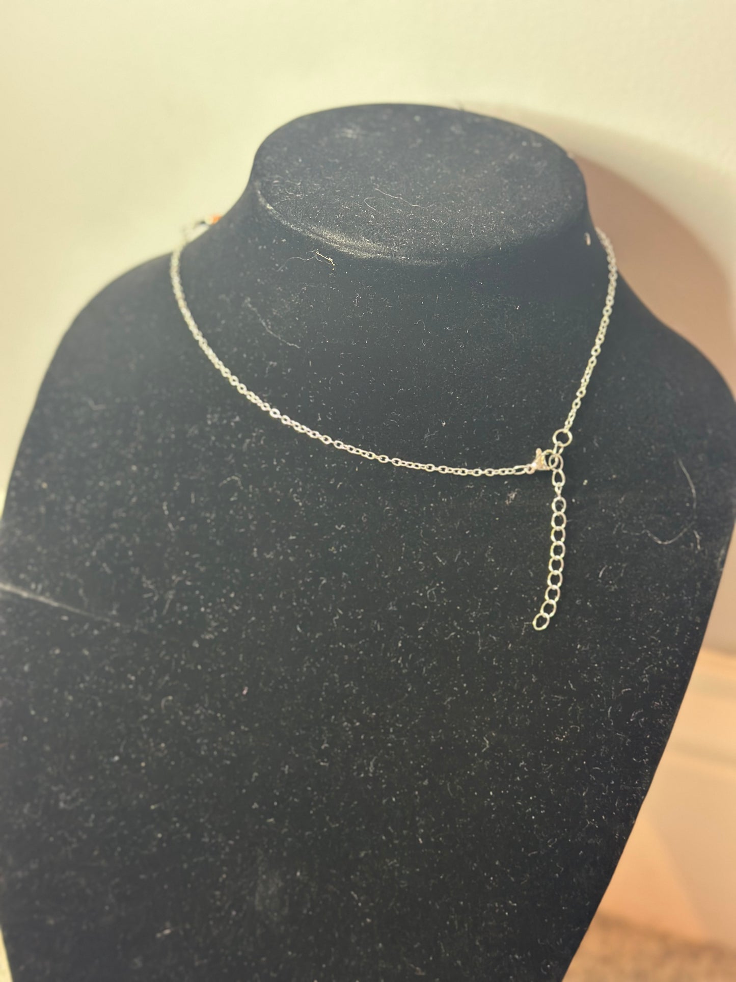 orange spiny star chain necklace