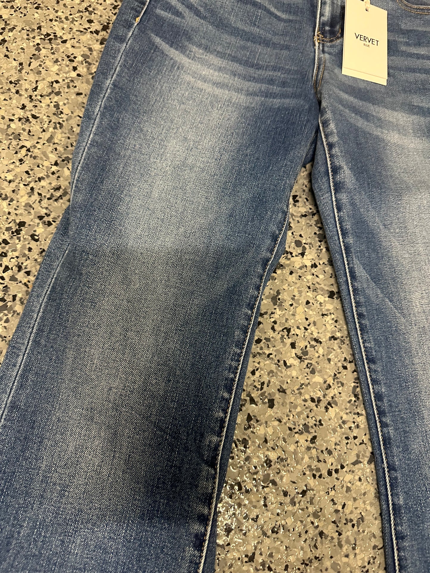 MID RISE RAW HEM FLARE JEANS