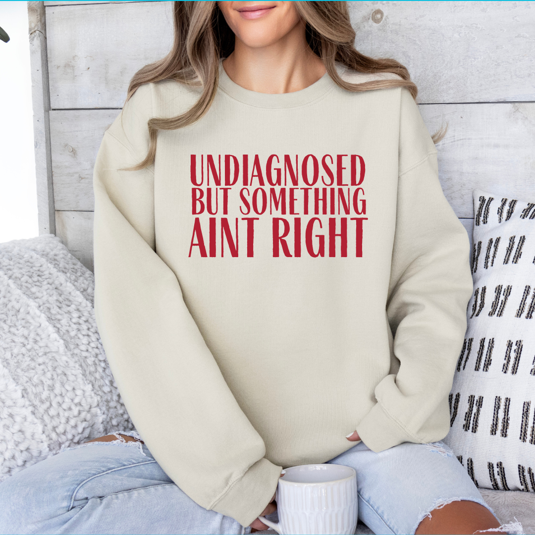 undiagnosed but something aint right crewneck