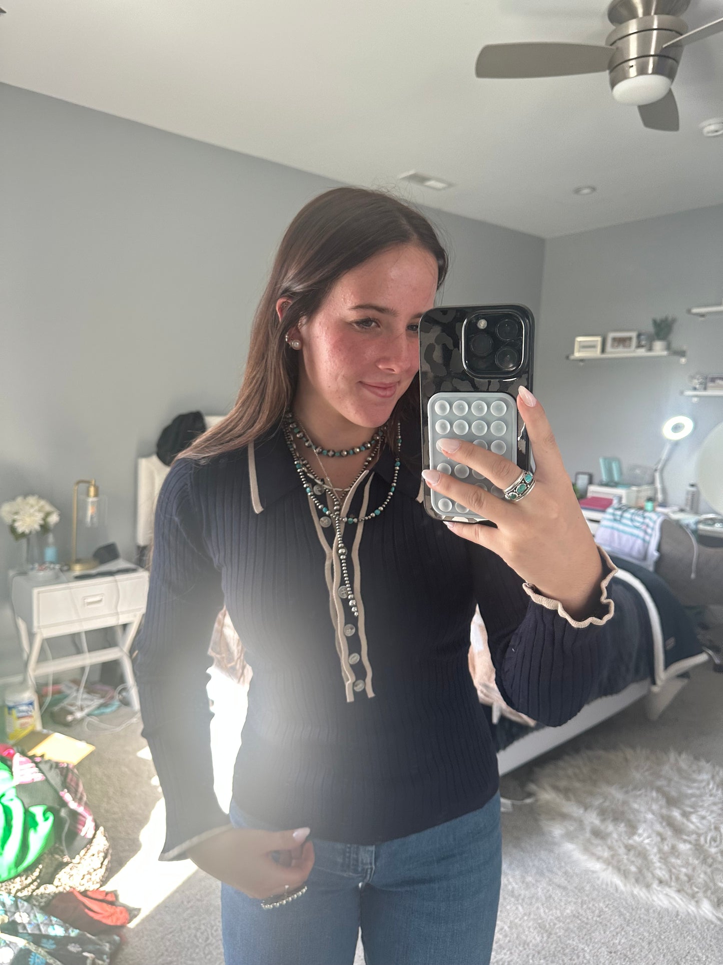 Solid ribbed long sleeve collared knit top