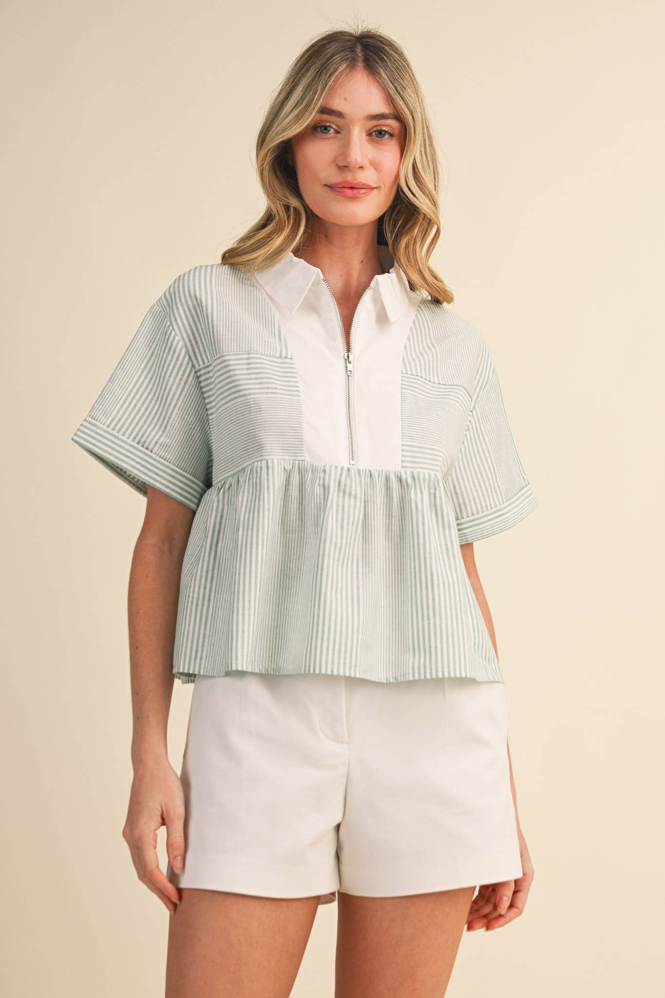 STRIPED HALF ZIP BABYDOLL TOP