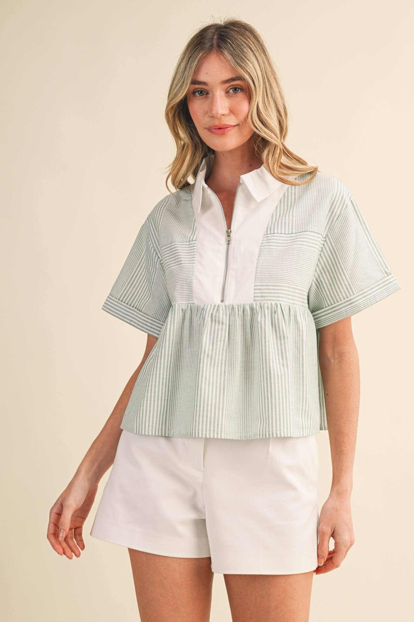STRIPED HALF ZIP BABYDOLL TOP