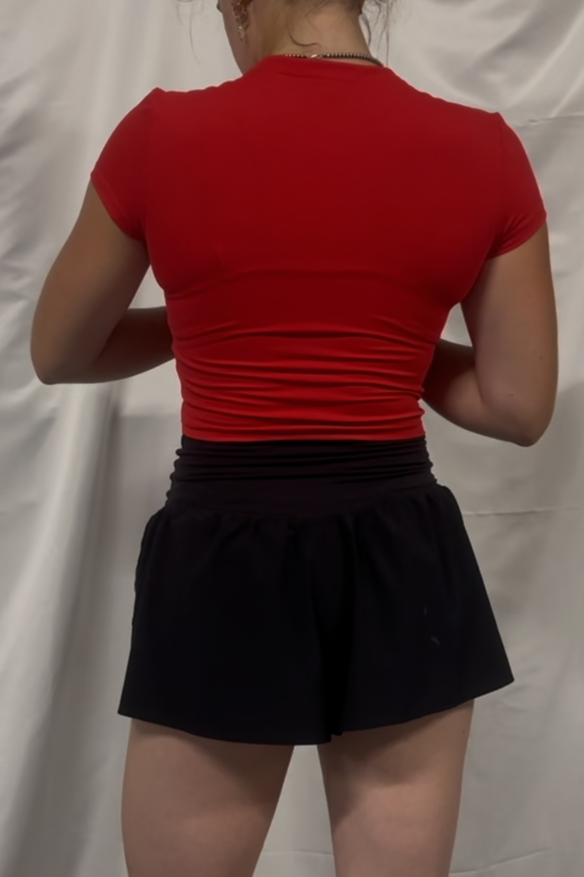 Cropped interlock short sleeve top