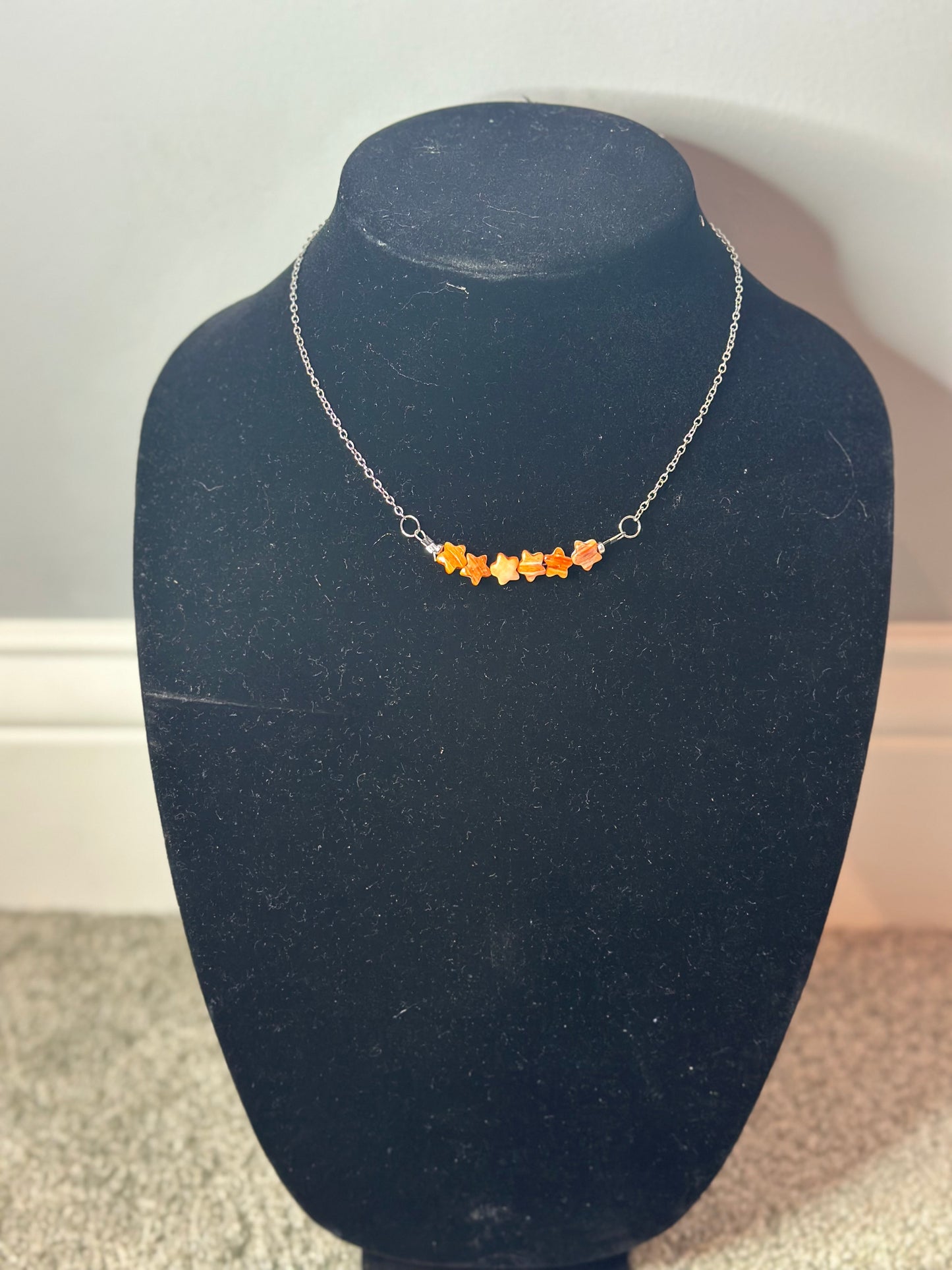 orange spiny star chain necklace