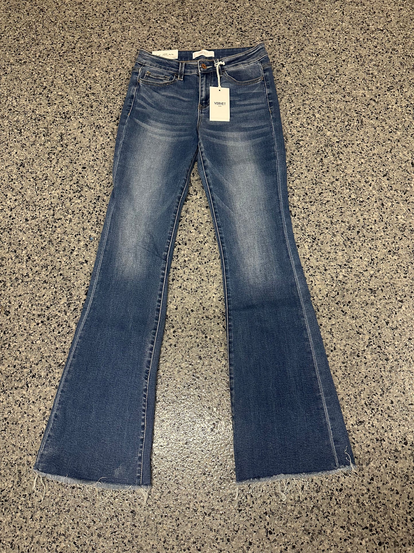 MID RISE RAW HEM FLARE JEANS