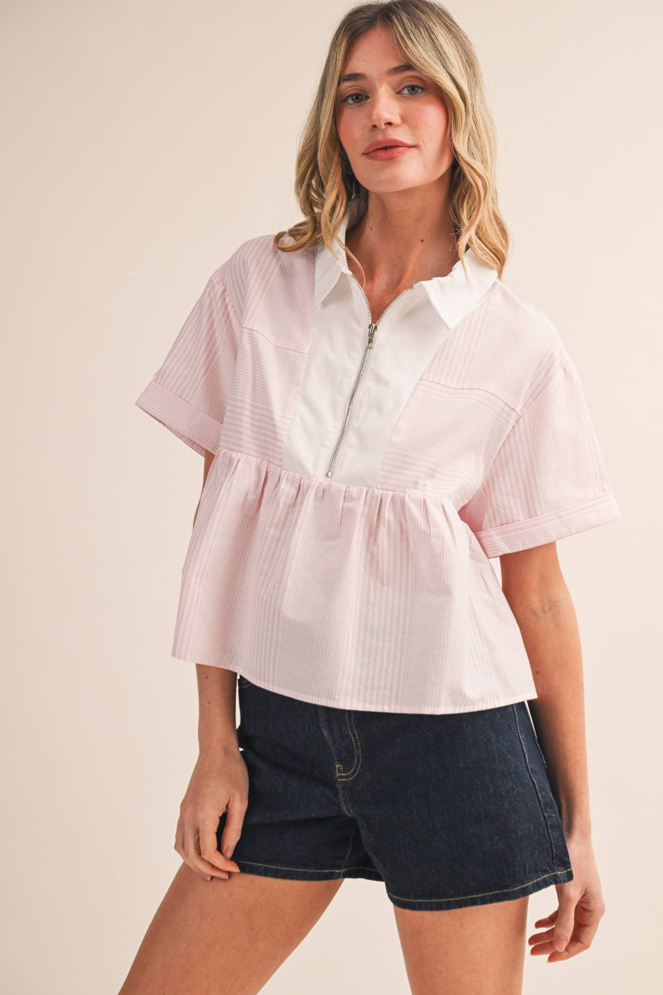 STRIPED HALF ZIP BABYDOLL TOP
