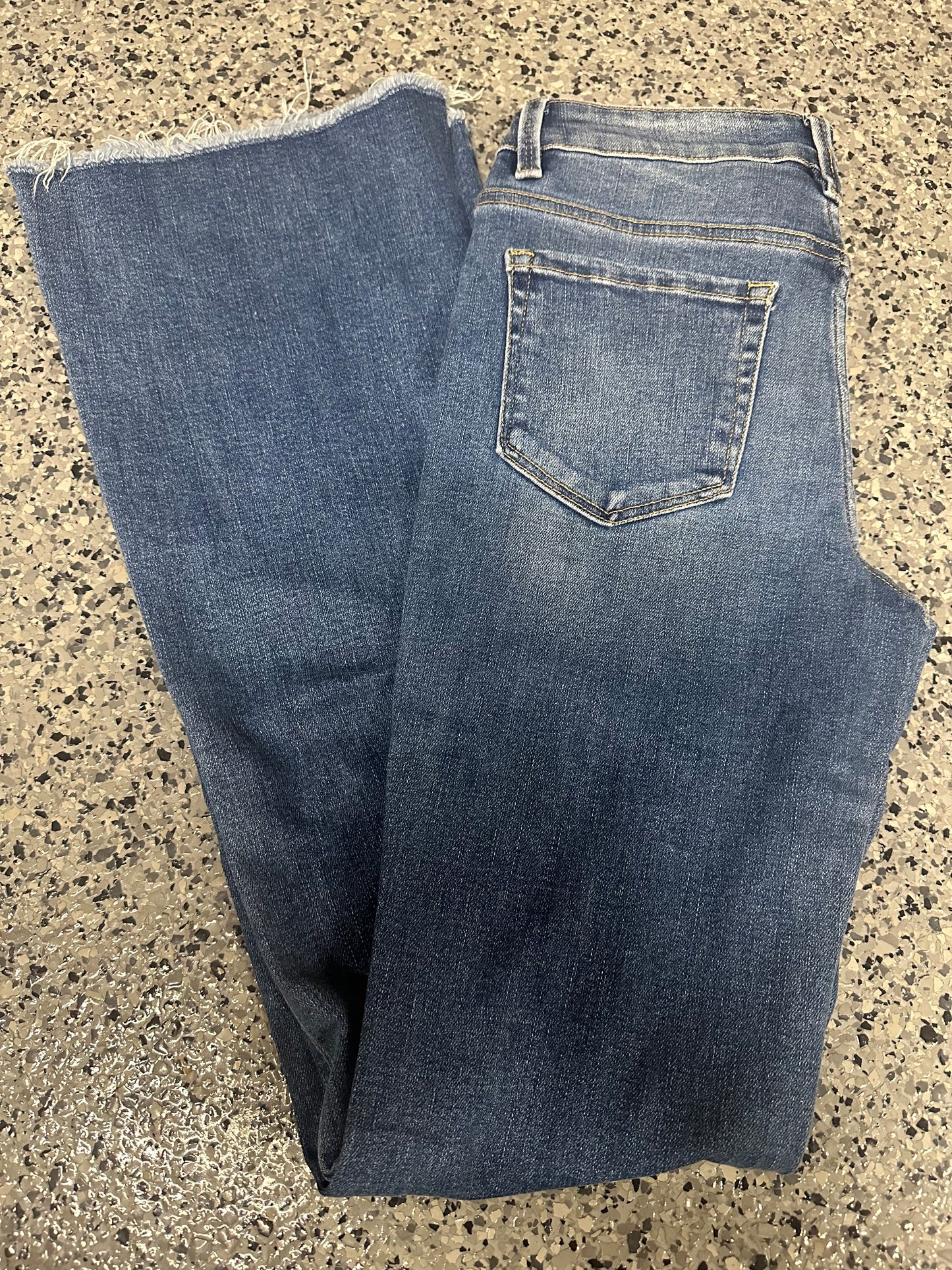 MID RISE RAW HEM FLARE JEANS