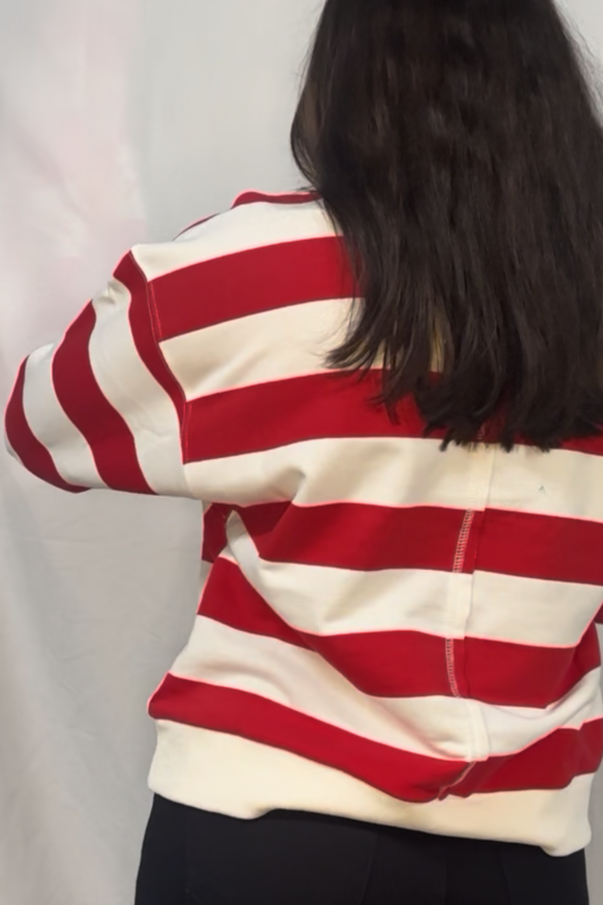 Drop shoulder 3/4 sleeves bold stripe casual top with V-notch.