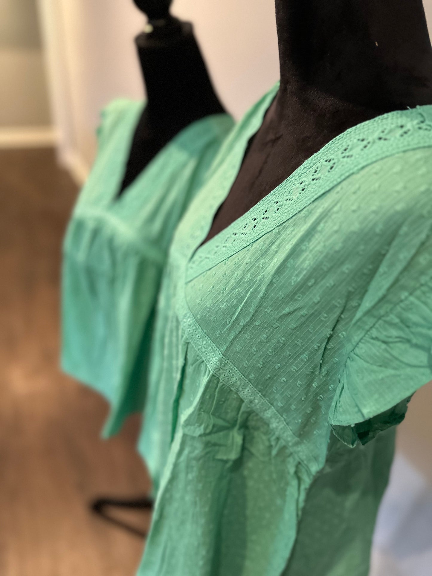 Green eyelet v neckline ruffle Swiss dot top