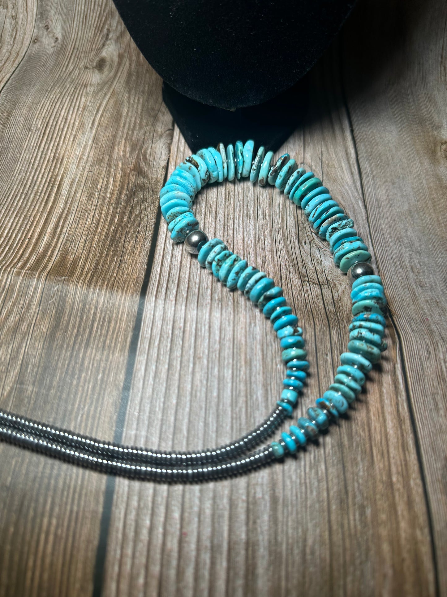 22 inch graduated turquoise necklace with Sterling silver pearls