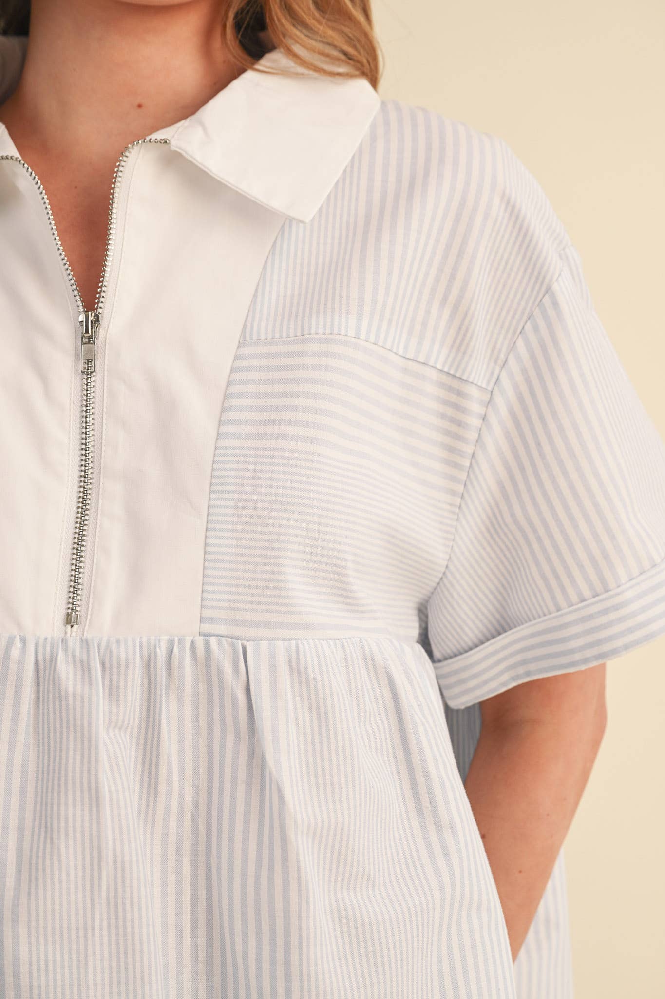STRIPED HALF ZIP BABYDOLL TOP