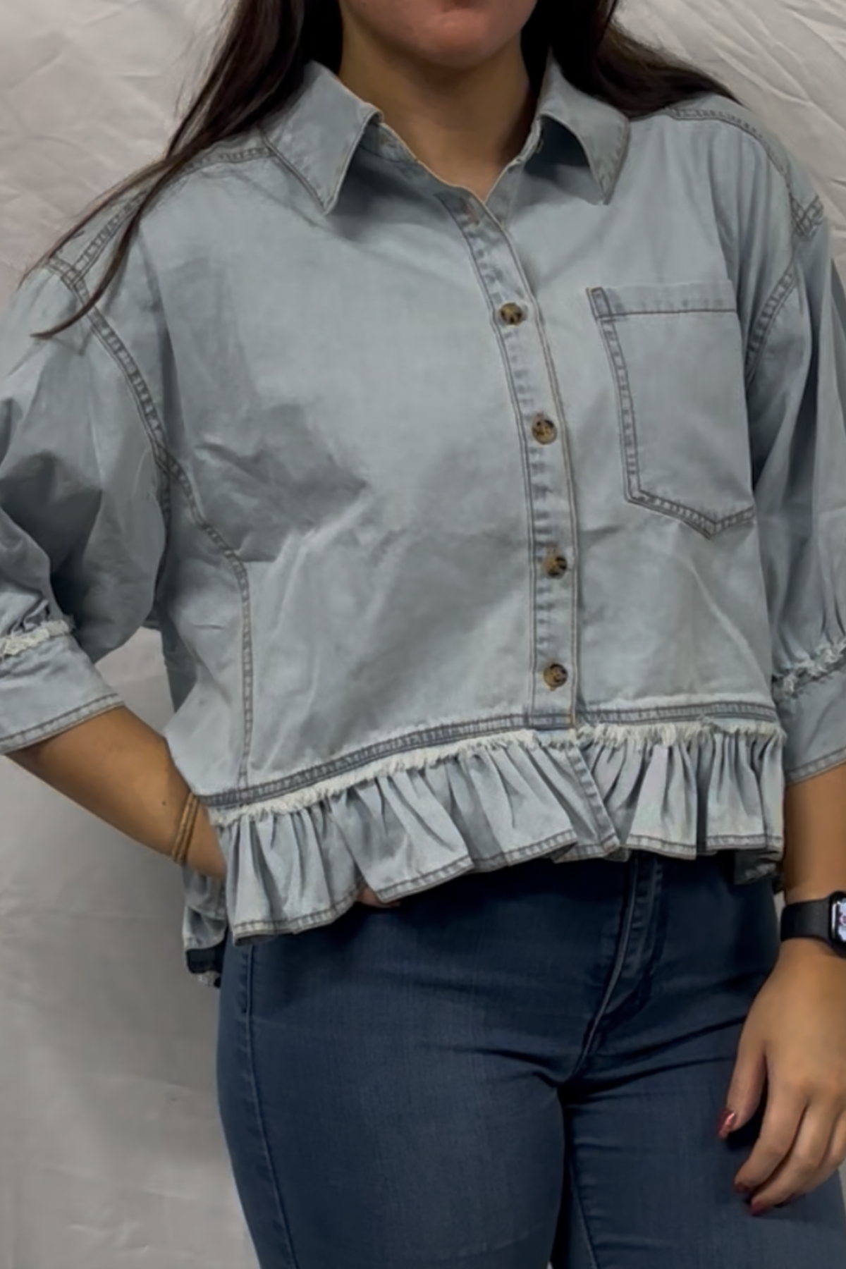 Washed denim ruffled hem button up