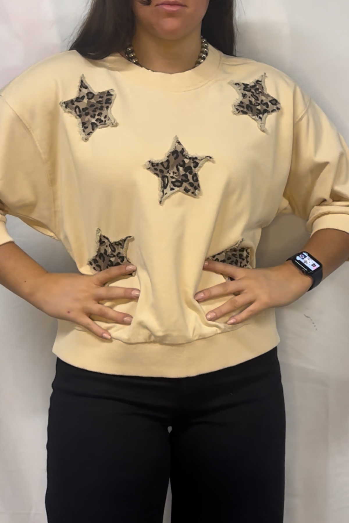 3/4 sleeves washed casual top with leopard star patch detail.