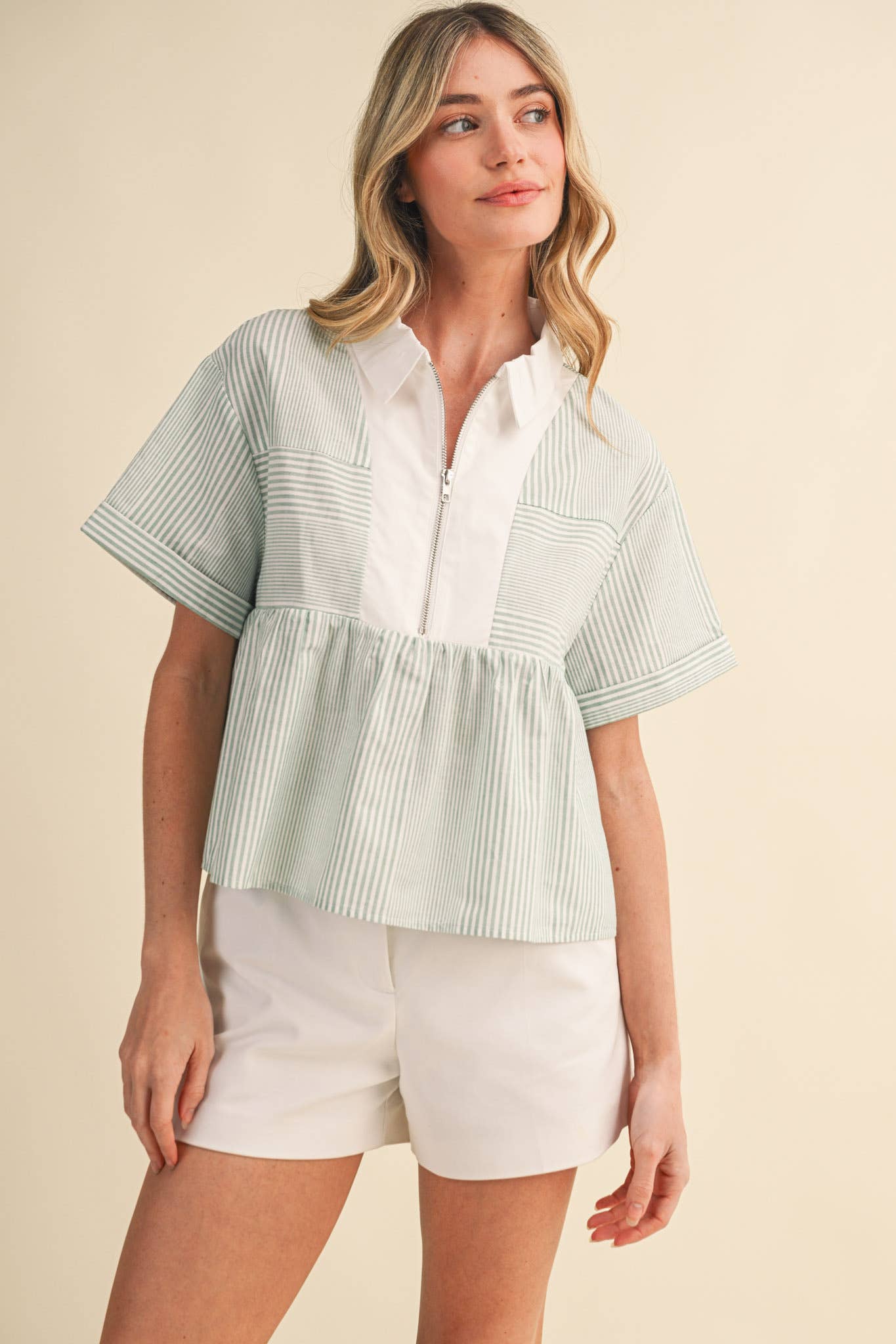 STRIPED HALF ZIP BABYDOLL TOP