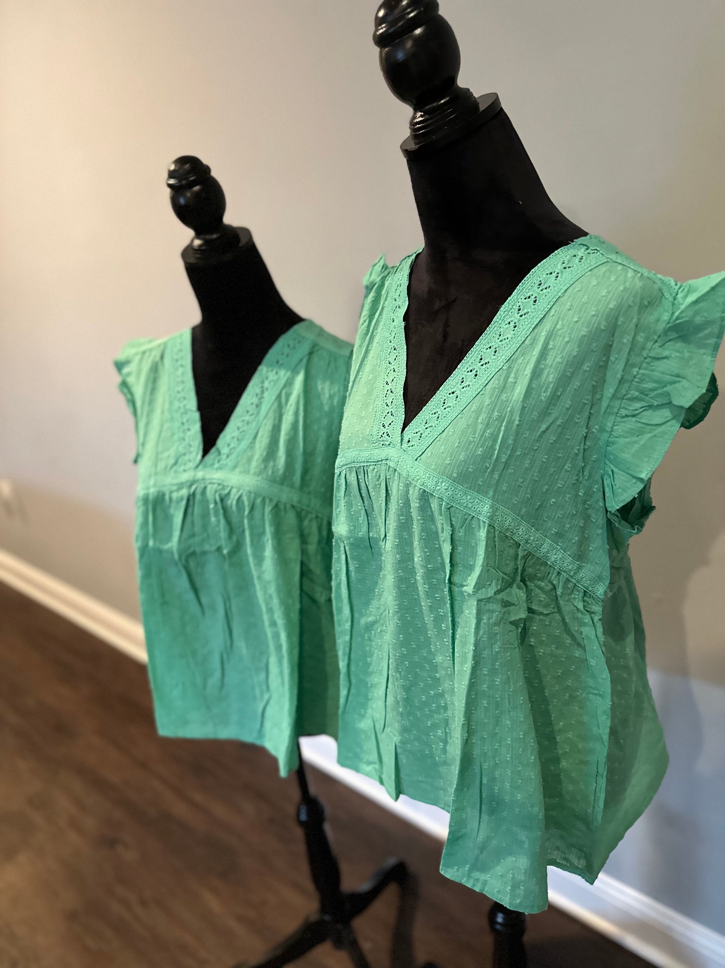 Green eyelet v neckline ruffle Swiss dot top