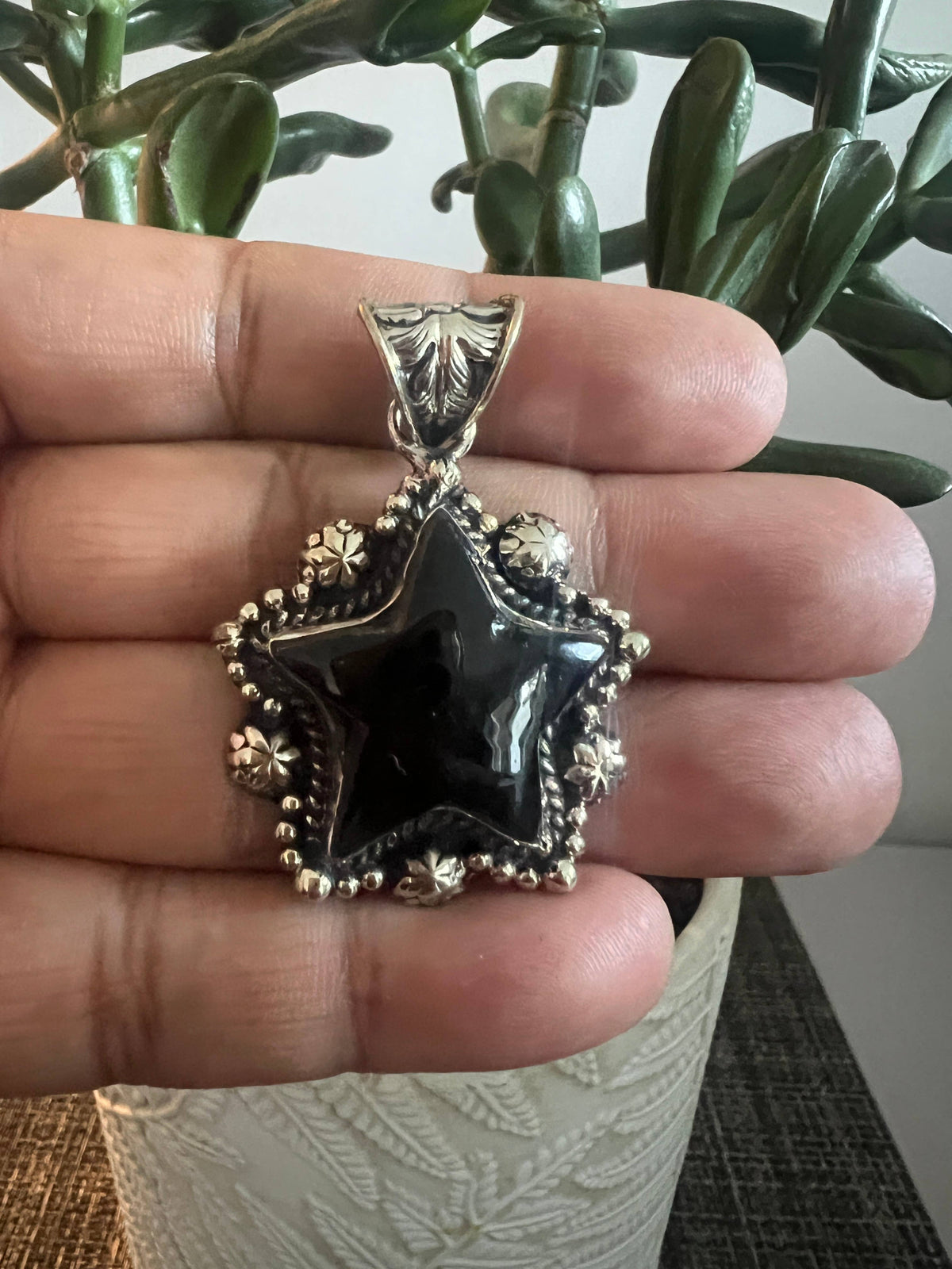 Black Oyx Star carved pendant, Tibetan repousse silver