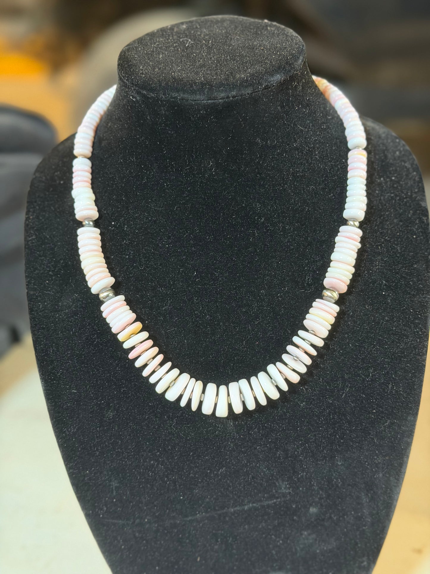 Graduated pink conch necklace