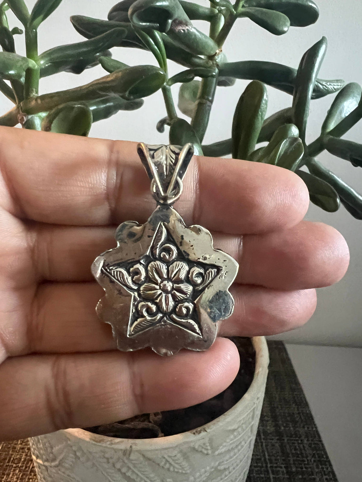 Black Oyx Star carved pendant, Tibetan repousse silver