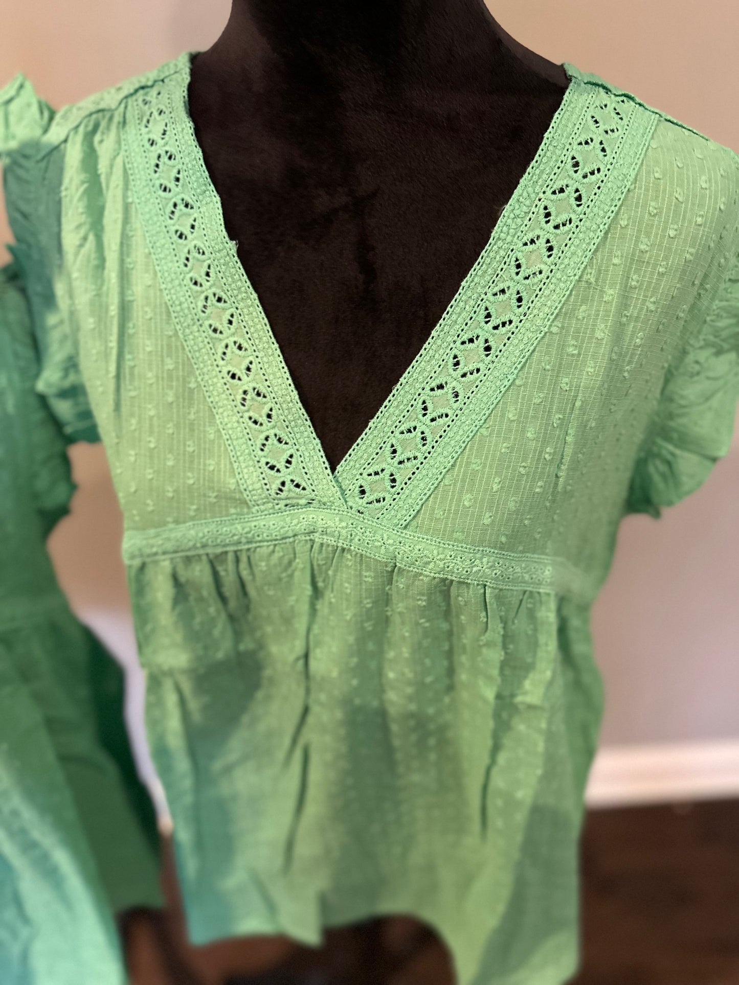 Green eyelet v neckline ruffle Swiss dot top