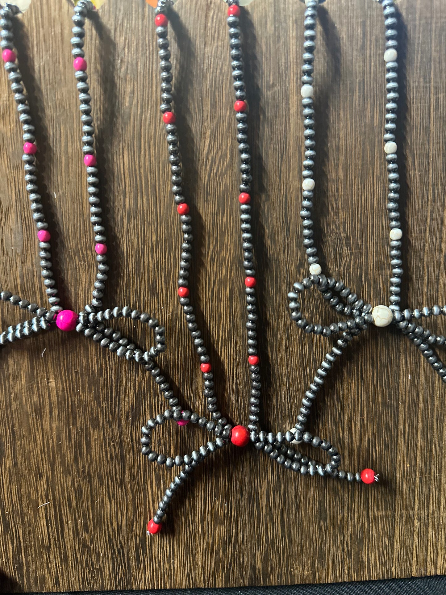 Navajo style pearl and stone bow necklace