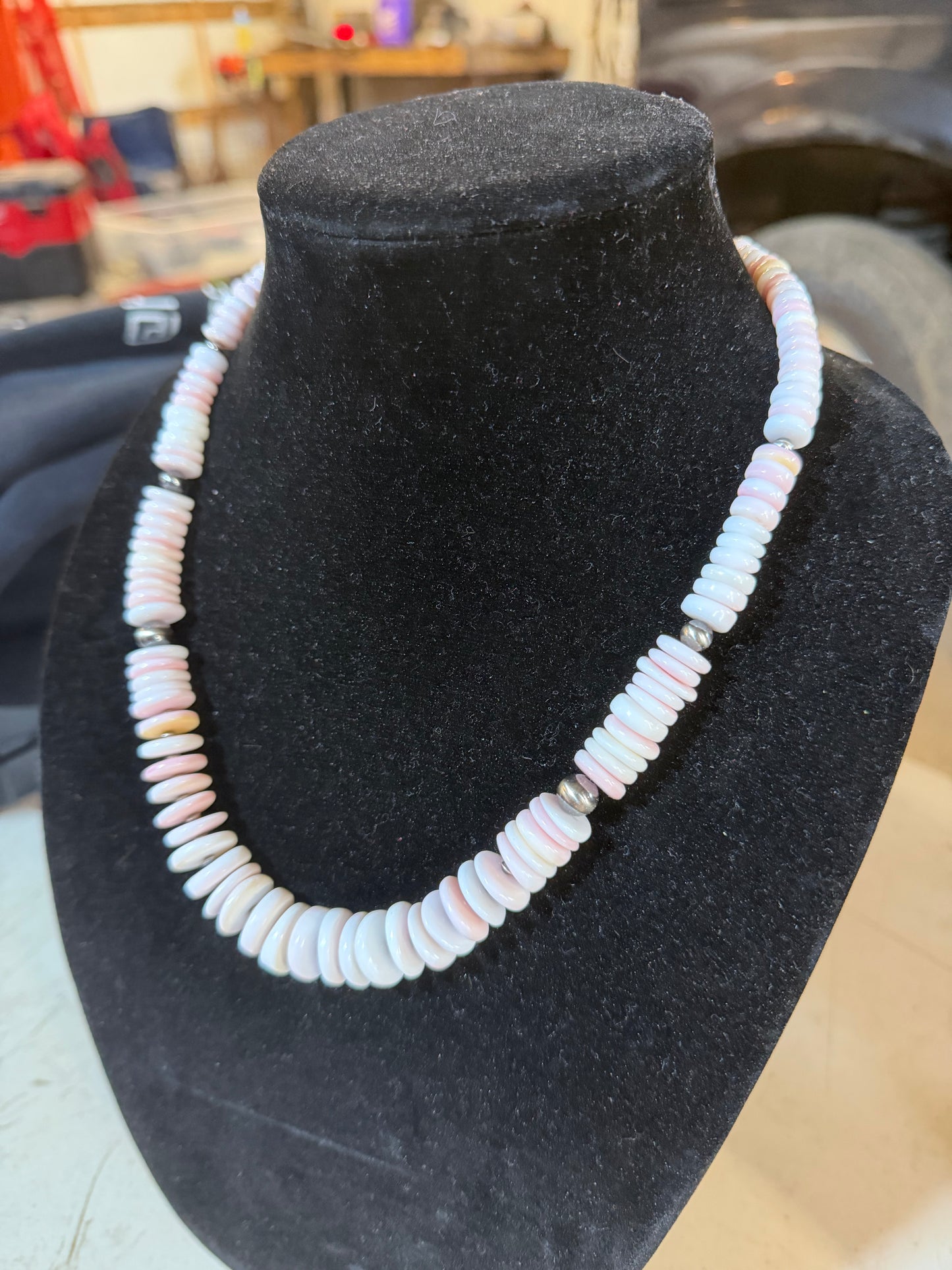 Graduated pink conch necklace