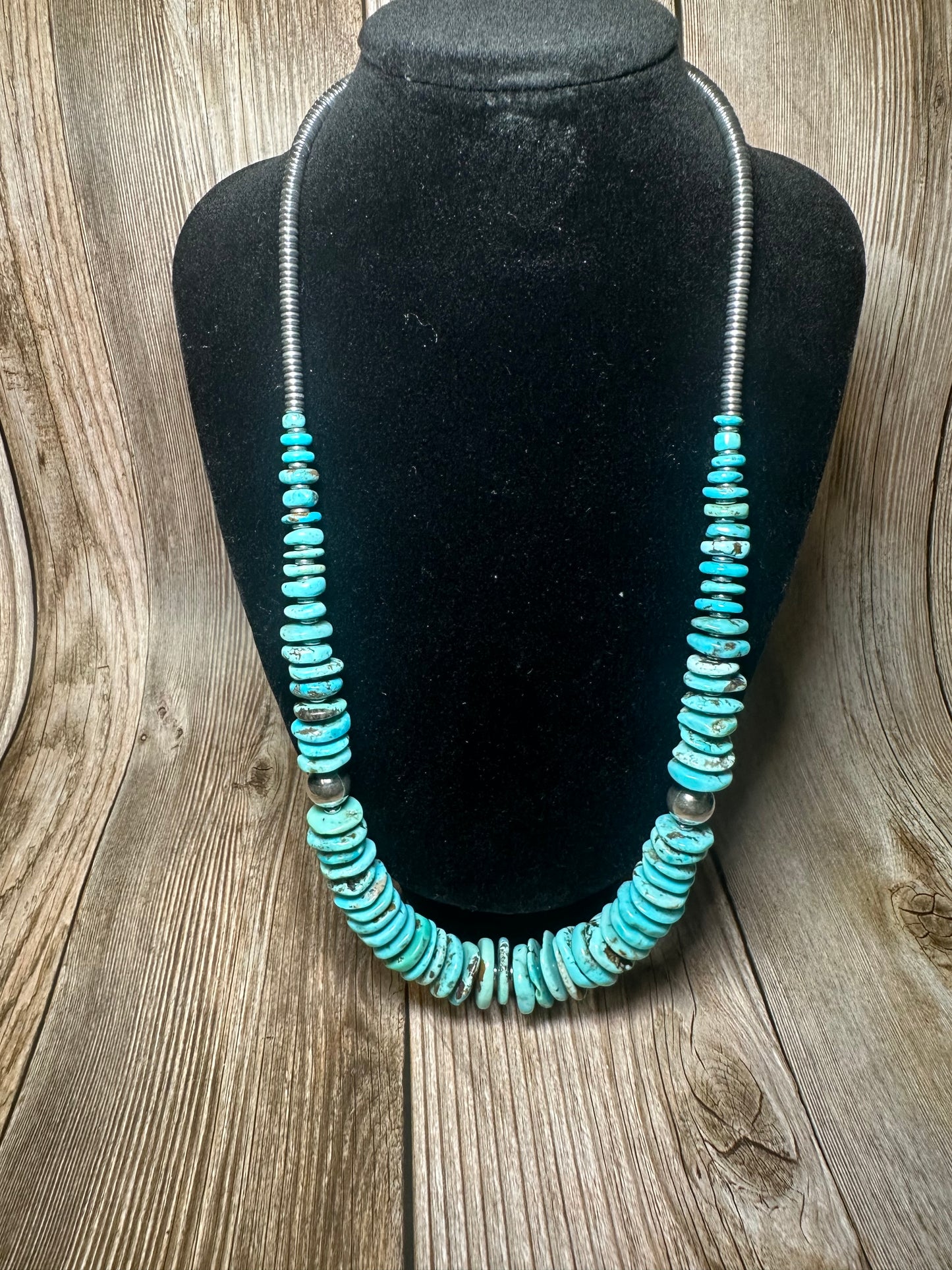 22 inch graduated turquoise necklace with Sterling silver pearls