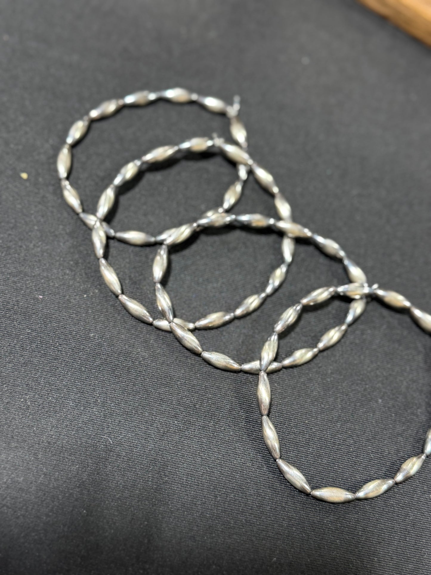 Handstrung sterling silver torpedo pearl stretch bracelet