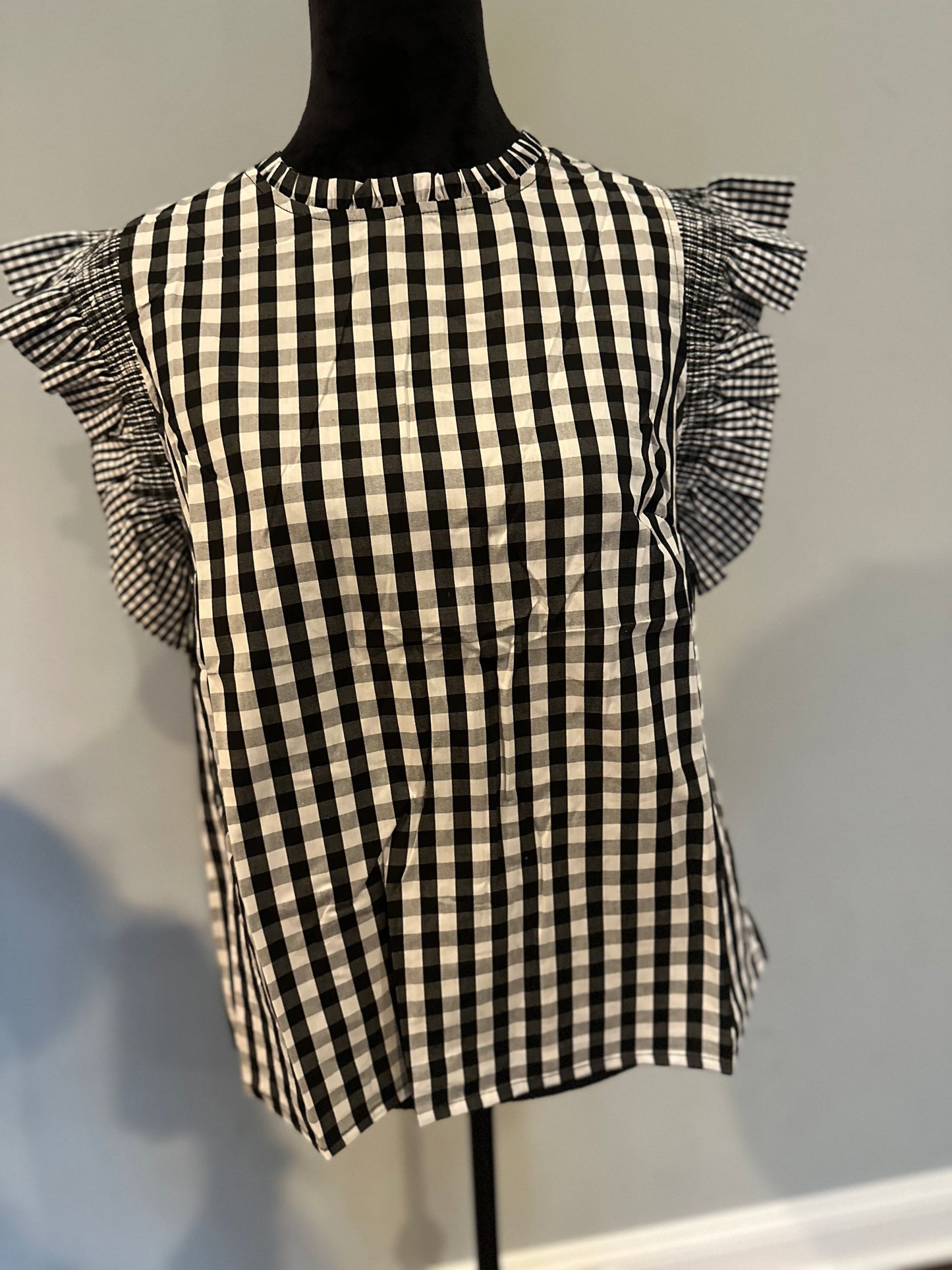 Checkered ruffle sleeve grilled neck blouse