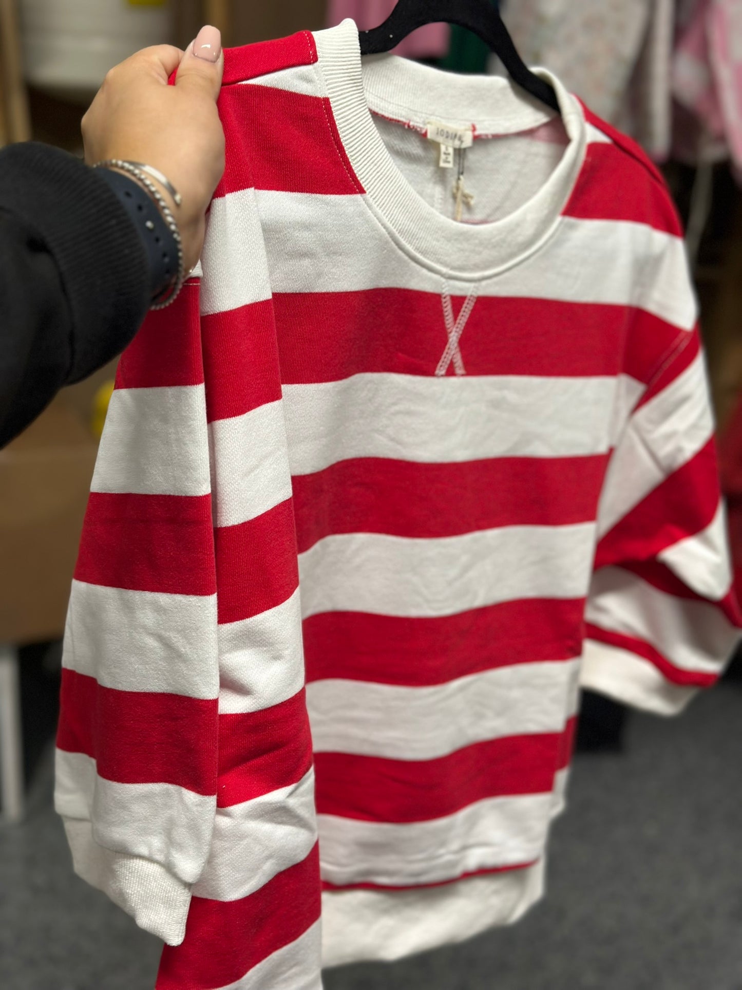 Drop shoulder 3/4 sleeves bold stripe casual top with V-notch.