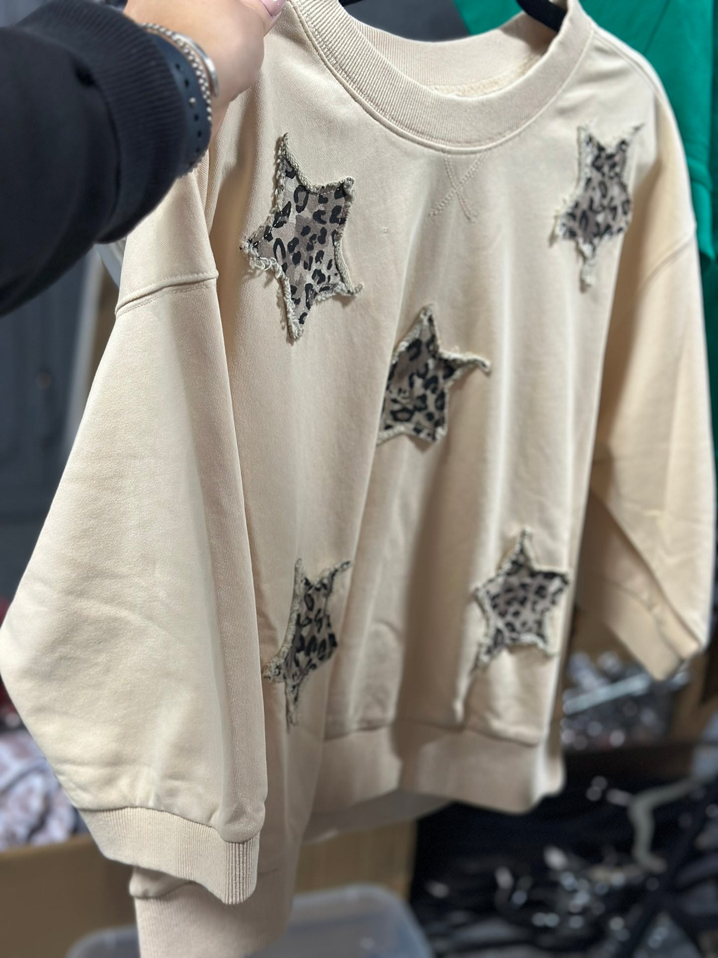 3/4 sleeves washed casual top with leopard star patch detail.