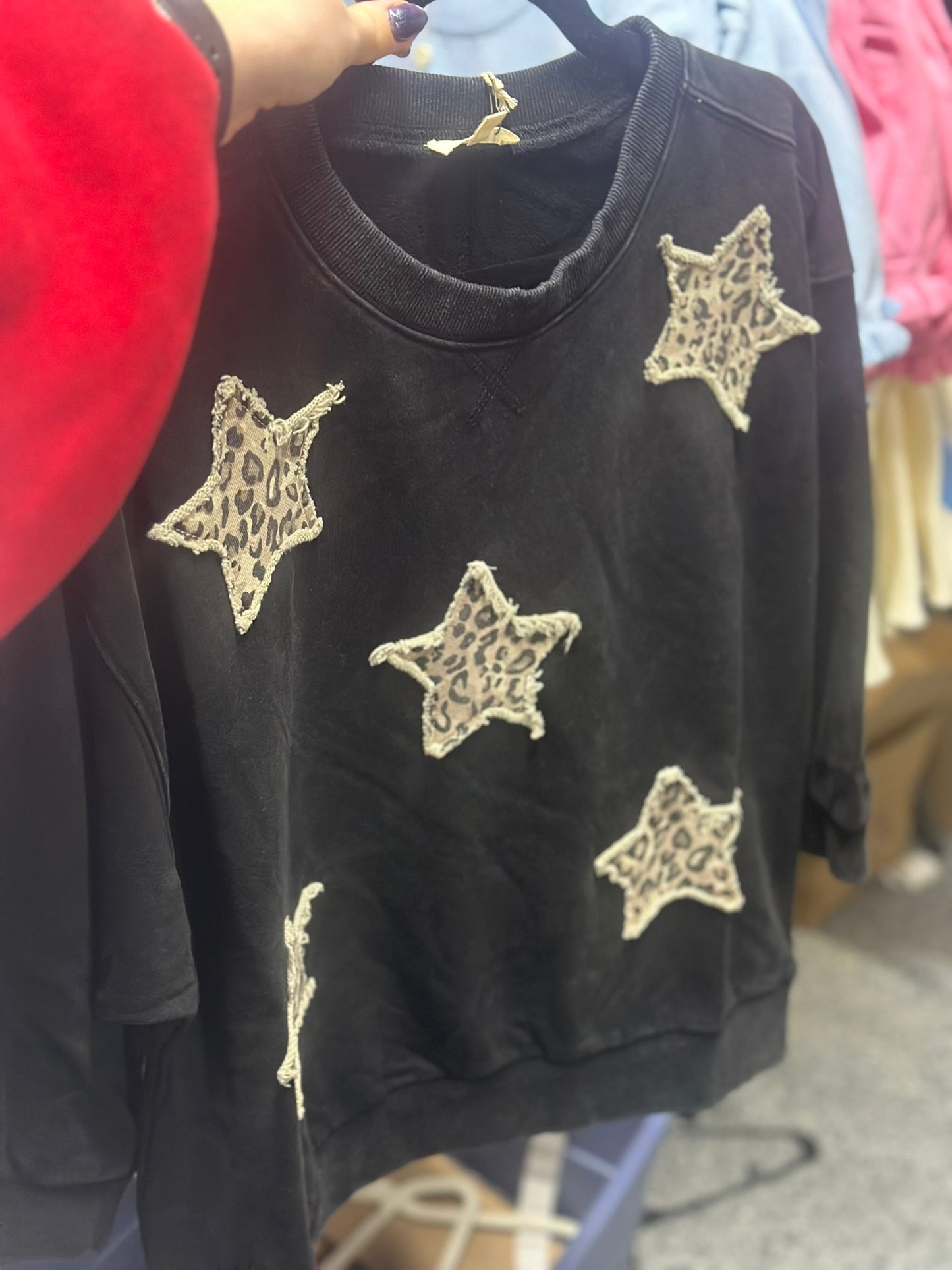 3/4 sleeves washed casual top with leopard star patch detail.