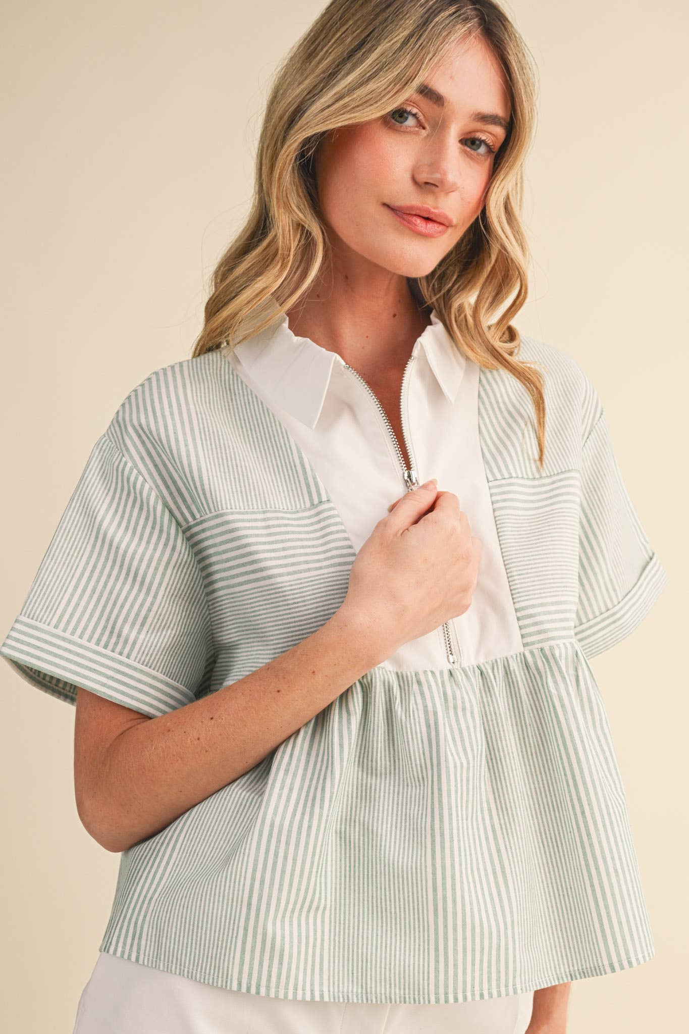 STRIPED HALF ZIP BABYDOLL TOP