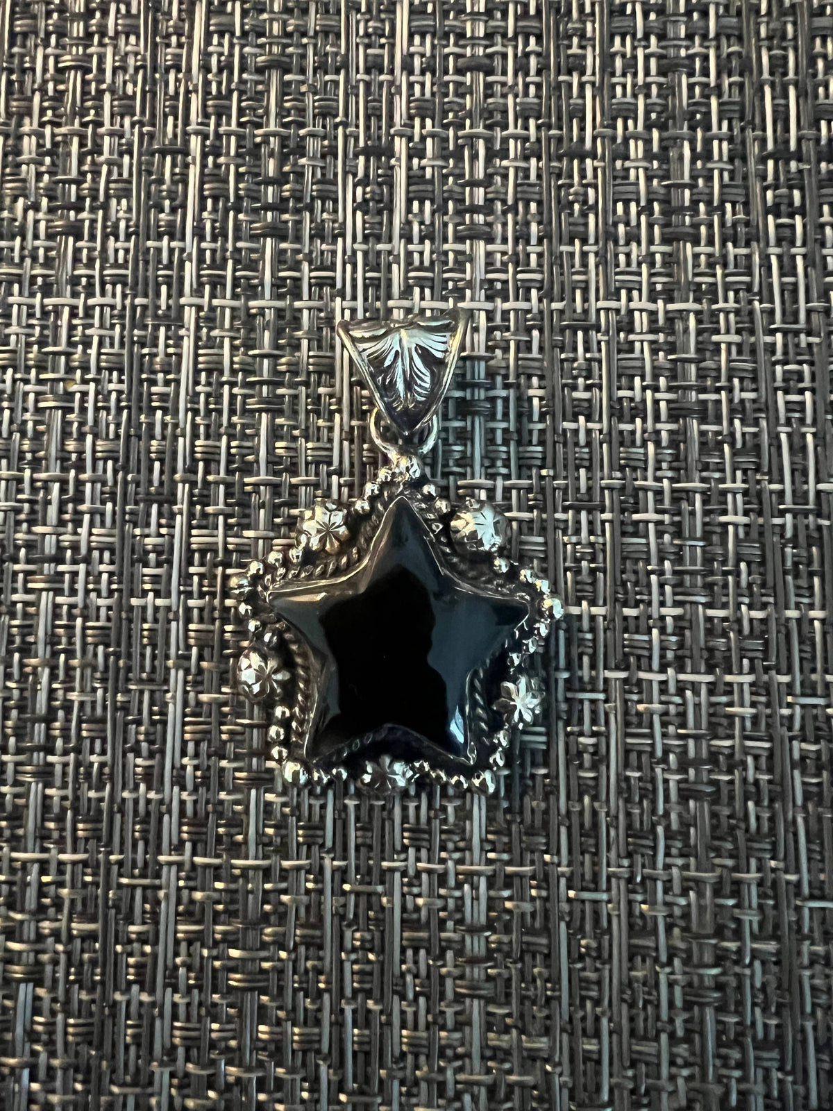 Black Oyx Star carved pendant, Tibetan repousse silver
