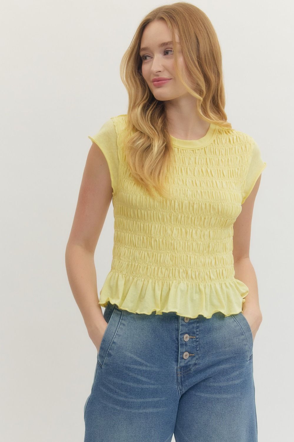 SMOCKED RUFFLE HEM BLOUSE *